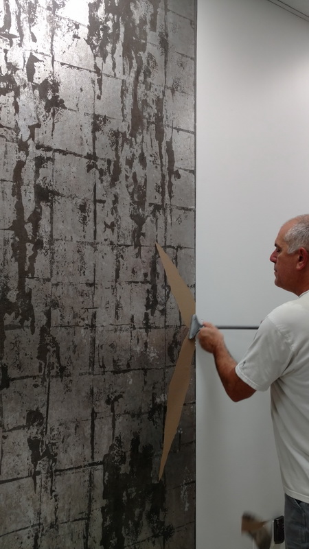 Wallpaper removal expert providing services at a Torrance, CA home.
